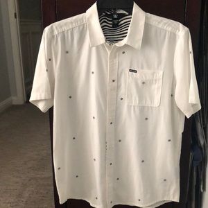 Boys XL/14Y button up white shirt with blue Volcom logo on shirt. Gently used.